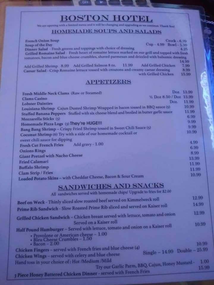 Restaurant menu with appetizers and dinner choices.